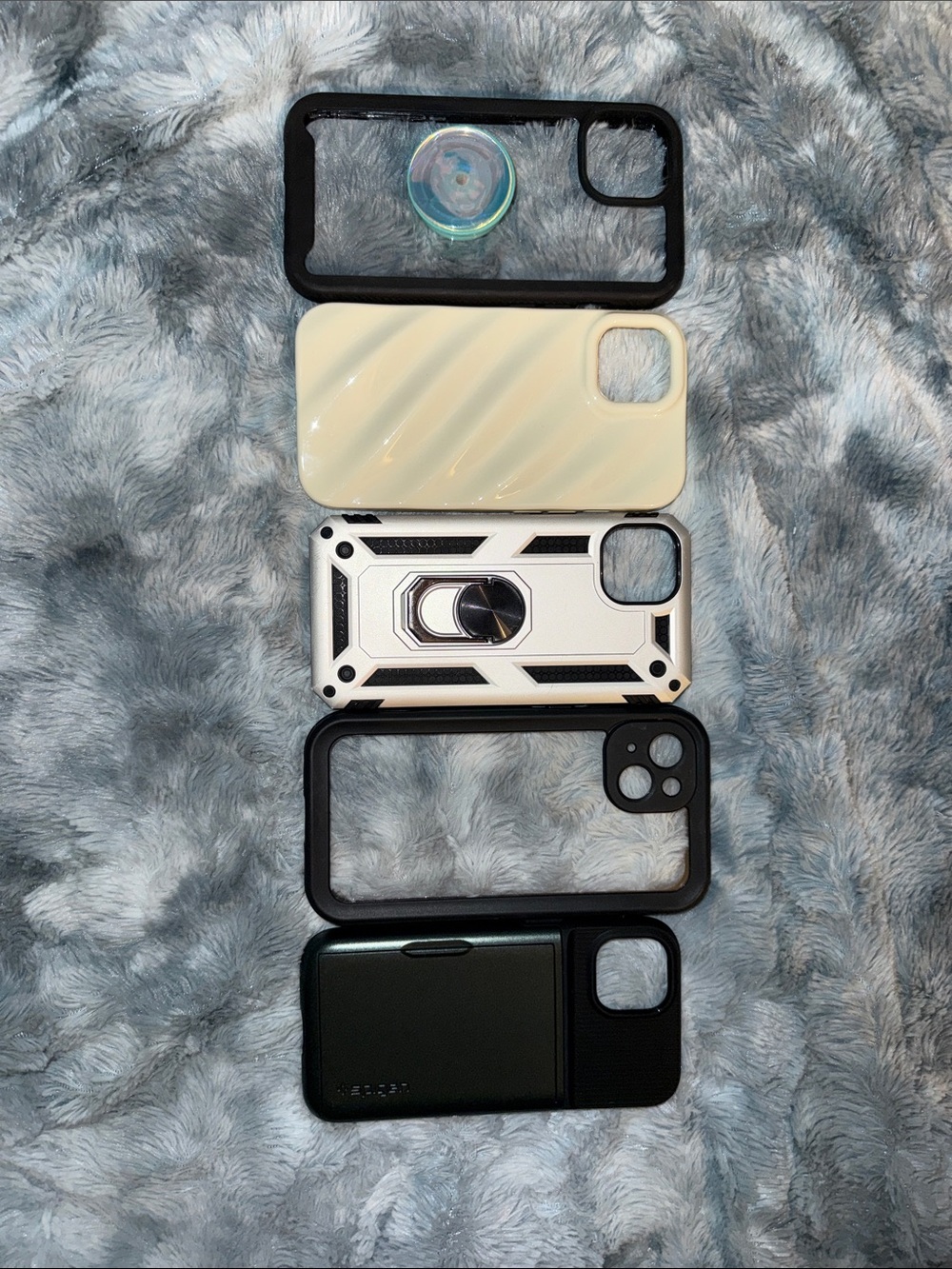 Protective Phone Case Set in Black, Cream, White, and Dark Green